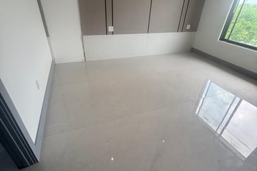 a room with a large window and a large windo clean floor and window post construction jobw