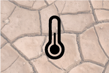 a thermometer on a tiled floor with a thermometer
