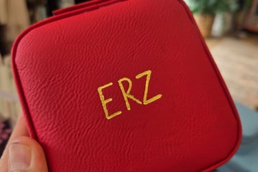 Leather debossing on jewelry case by Handwritten by Belle.