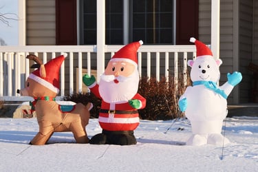 inflatable Santa, reindeer, and bear displays