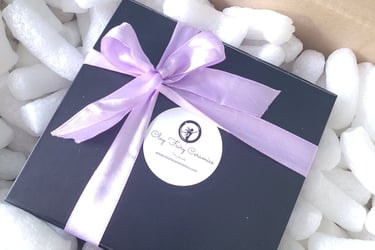 sleek black magnetic gifting presentation box with coloured ribbon