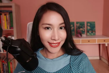 a woman is holding a hair dryer in her hand