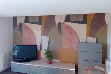 Revêtement mural de plusieurs couleurs, tons orangés et rosés, réalisé par Entreprise Couleurs Bassi