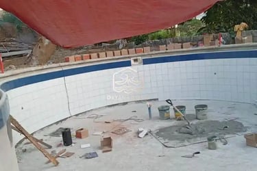 Renovasi keramik kolam renang yang rusak tanpa menguras air