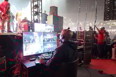 Video production backstage at concert.