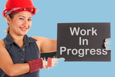 a woman in a hard hat and a hard hat