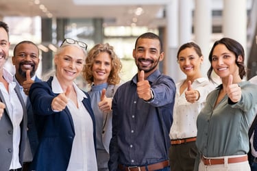 Accountant team all giving the thumbs up to Cromeloan