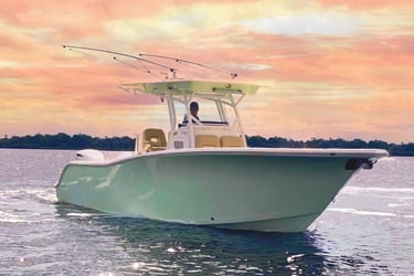 a man fishing on a boat in the water