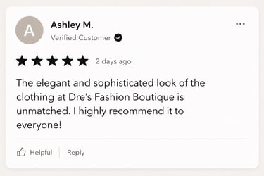 A five-star customer review for Dre's Fashion Boutique praising their elegant and sophisticated clothing collection.