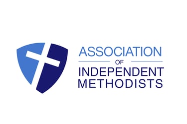 Association of Independent Methodists logo featuring a blue shield and white cross.