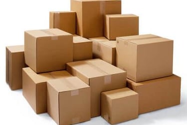 a pile of cardboard boxes with boxes on top
