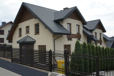 a house with a fenced in area with a fenced in area
