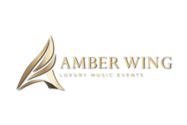 Elegant gold Amber Wing logo for luxury music events on a black background.
