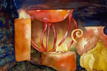 Two dramatic warm flickering candles and vases in golds, reds and earth tones in a dark atmosphere