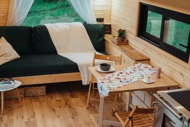Tiny House living room with green sofa