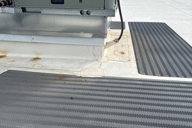 Forensic sequence showing a minor leak defect mark on a TPO walk pad