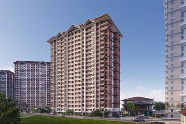 Modern multi-story residential apartment buildings in an urban condominium complex with green landscaping.