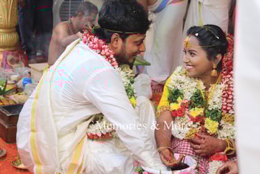 a man and woman in traditional indian wedding attire
