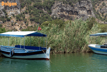 two boats are parked in the water