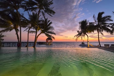Ozen Life Maadhoo Maldives sunset pool
