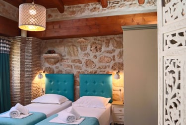 Twin beds of Loft area in Villa Galanoussa