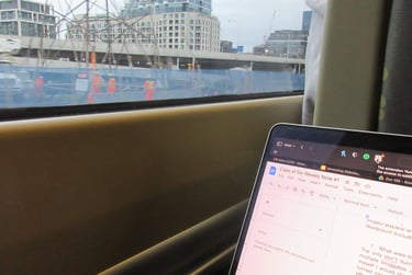 a laptop computer sitting on a table with a laptop on it