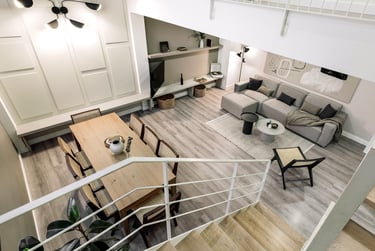 Contemporary loft apartment with a minimalist design, subtle lighting, neutral colors in Barcelona