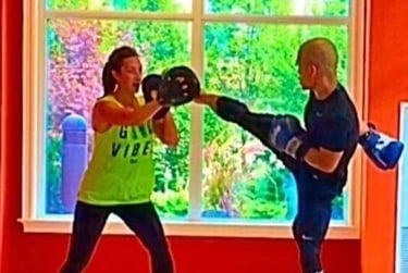A man and woman doing JEET KUNE DO NORTH YORK PERSONAL TRAINING!