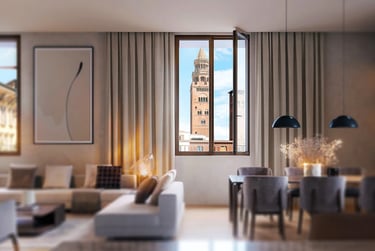 Interno residenziale moderno con vista sul Torrazzo di Cremona, rappresentativo delle residenze sviluppate da Findonati.