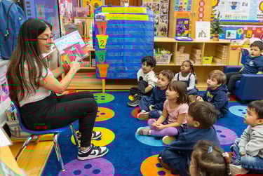 teacher reading oopa book to class