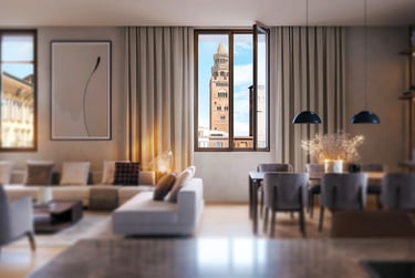 Interno residenziale moderno con vista sul Torrazzo di Cremona, rappresentativo delle residenze sviluppate da Findonati.