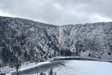 a person on a snow covered mountain top