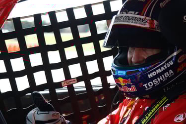 Race Car Diver behind window net NASA Member Benefits Motorsports Gear