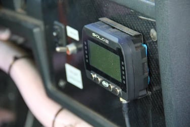 Motorsports Data Logger installed on race seat NASA Member Benefits Motorsports Gear