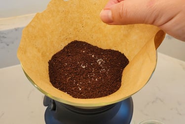 sprinkle of salt on coffee grounds