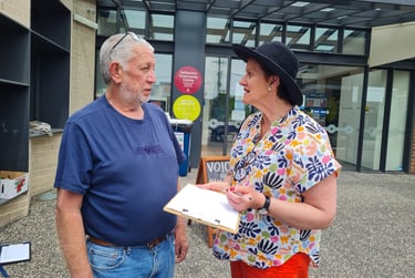 Voices OF Chisholm out in the community talking to people