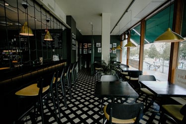 a restaurant with a checkered floor and a checkered floor