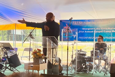 Pastor Brian from Valleyview Victory Church Bringing the Word of God at the tent meeting Sunday Morn