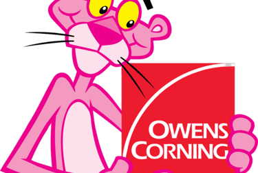 Owens Corning logo sign against a black background.
