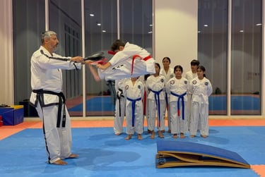 Master Carlos Bazan, ITF World Champion, teaching students Taekwon-Do in Dubai