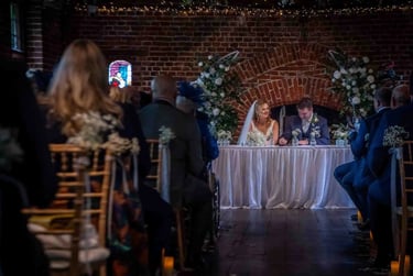 signing the wedding register at tudor barn