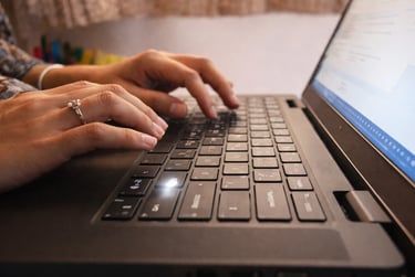 Professional work on laptop developing websites and digital solutions for clients