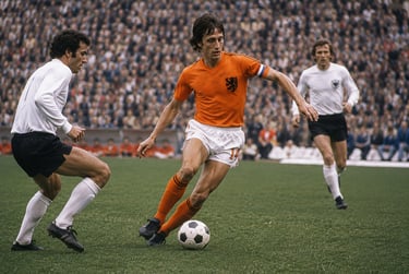 Johan Cruyff dribbling the ball for the Netherlands during a 1974 World Cup football match.