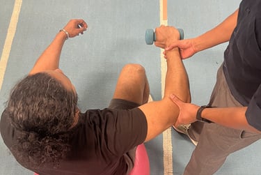 Elbow pain physiotherapy treatment in Neath, South Wales.