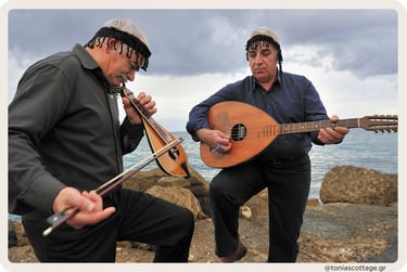 Two men playing traditional Cretan music outdoors