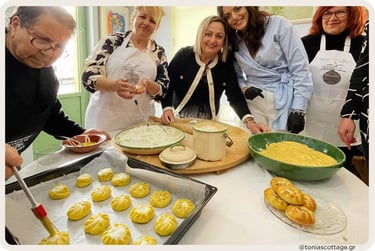 Women making traditional pastries at a cooking workshop at the Cretan Cuisine Festival.
