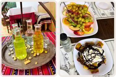 Tray of colorful raki shots, and plates of fresh fruit and chocolate‑drizzled dessert with fruits