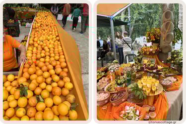 Festive table with citrus-themed treats, flowers, and juices at an Fodele festival in Crete