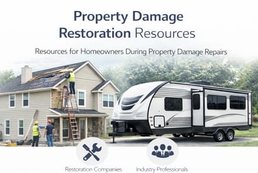Contractors repairing roof while RV trailer provides temporary housing