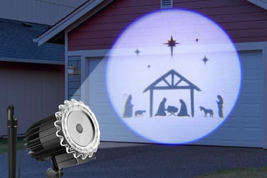 Outdoor nativity projector on garage